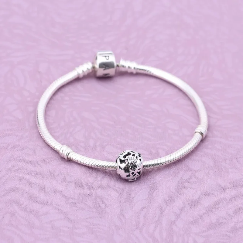 (kép) PANDORA Föld körül, áttört mintás charm - 791718CZ - Megtekintés 2