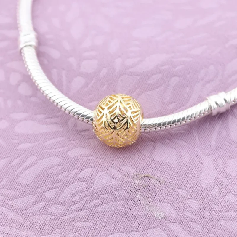 (kép) PANDORA Tropicana, áttört mintás charm, 14 karátos arany - 750834 - Megtekintés 2