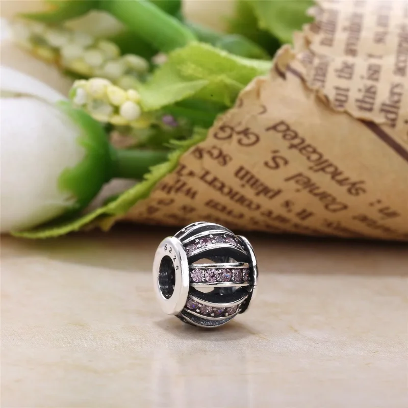 (kép) PANDORA Áttört mintás hordó alakú charm - 791115CZ - Megtekintés 2