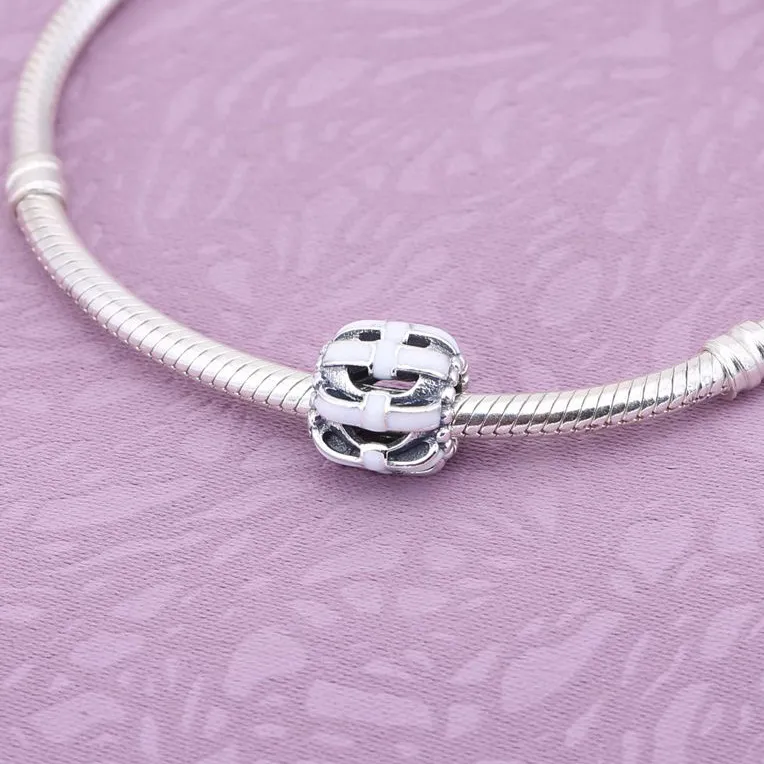(kép) PANDORA Áttört mintás masnis charm - 791778EN40 - Megtekintés 4